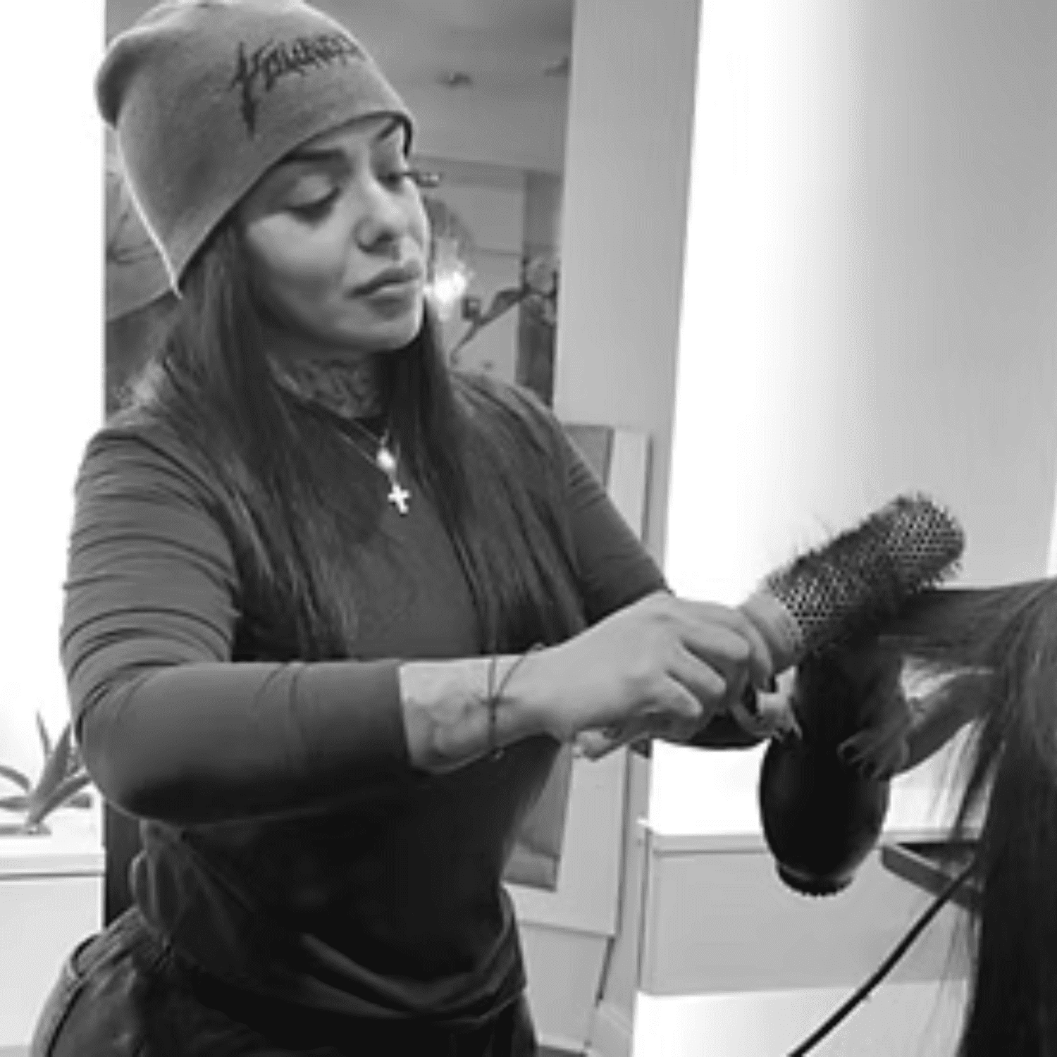 Portrait of Diana Suero, a professional stylist at Salon Caru, showcasing their expertise and style.