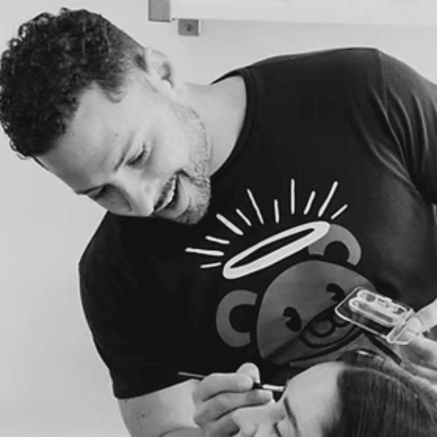Portrait of David DiGiacomo, a professional stylist at Salon Caru, showcasing their expertise and style.